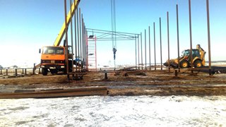 Аренда экскаватора погрузчика с ямобуром в Долгопрудный цена от 1543 руб